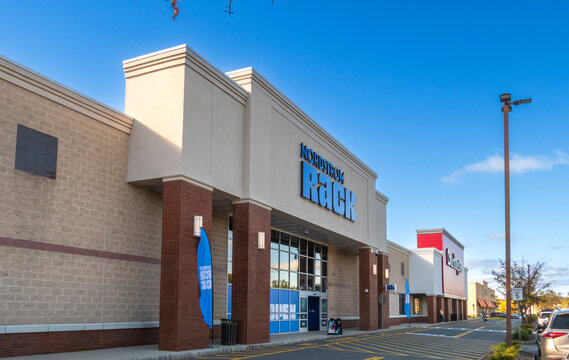 Ramsey, NJ - US - Oct 12, 2026 : Nordstrom Rack occupies a larger retail building at Interstate Shopping Center, with blue storefront lettering, brick columns, glass doors, and adjacent retail stores.