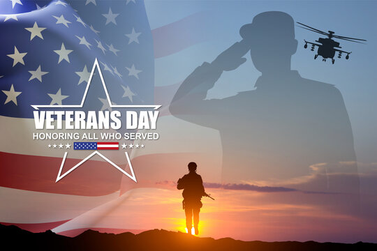 Silhouettes of a soldiers with USA flag against the sunset. Veterans Day concept