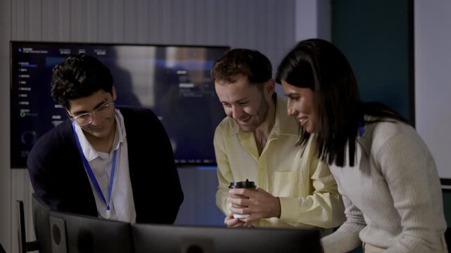 Product Manager reviews tablet beside colleagues holding notebook, coordinating software ideas during practical workplace discussion, bringing office knowledge exchange into office practice.