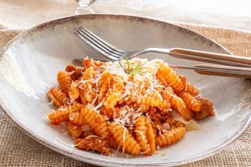 Gnocchetti sardi alla campidanese - con salsiccia, pomodoro e formaggio pecorino © Stillkost