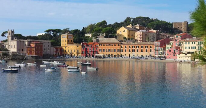 Scenic view Baia del Silenzio Sestri Levante Liguria colorful houses sea bay. Slow travel Mediterranean destination wanderlust romantic coastal vacation mood. Tourism video summer holiday trip.