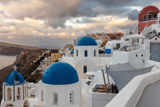 Scenic view of Oia village in Santorini with iconic blue domes under