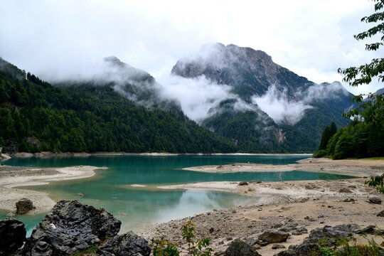 Low Clouds Over the Rocky Shore of Lake Predil, Italy