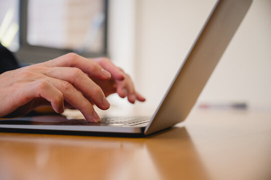 Man hands typing on computer keyboard, Document data system Report HR technology Concept Manager checking white documents reports papers of files icon in modern office