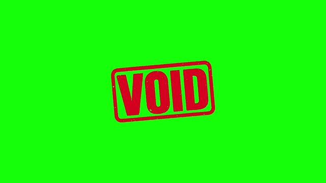 Red VOID rubber stamp pressed with wooden stamper on green screen