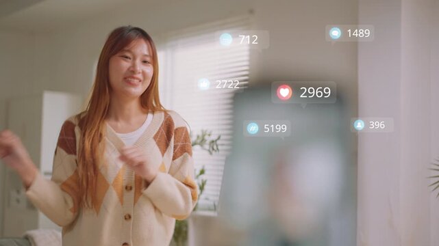 Viral dance post, young Asian woman dancing at home with growing likes and comments counters