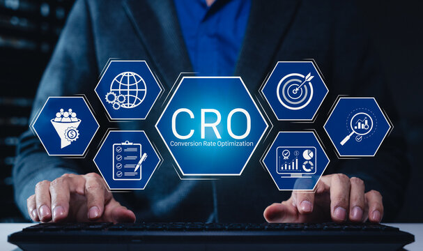 CRO conversion rate optimization concept. Businessman typing on keyboard with digital marketing funnel icon, sale target goal, website performance evaluation checklist, online visitor revenue strategy