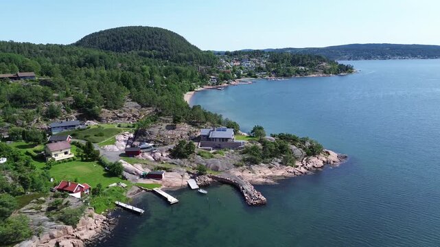 Drone View of Summer Cabins and Rocky Coastline at Buene Near Svelvik, Norway