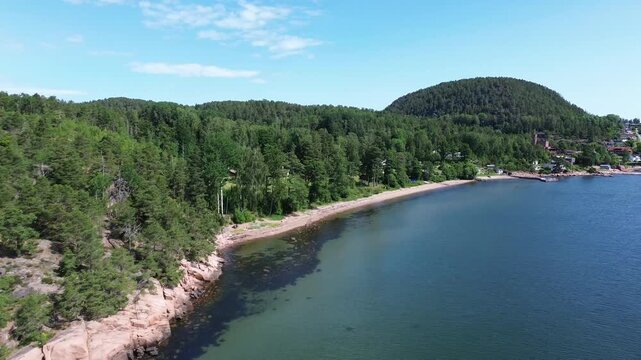 Close Aerial Drone Flight Along Hagasand Beach Near Svelvik, Norway