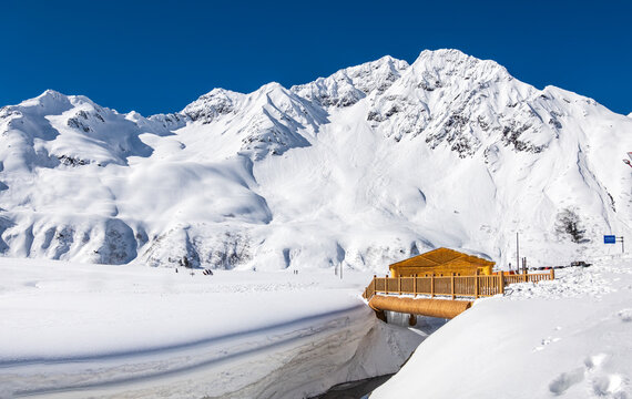 Building under heavy snow drifts at Galongla Mountain, Medog, Nyingchi, Xizang