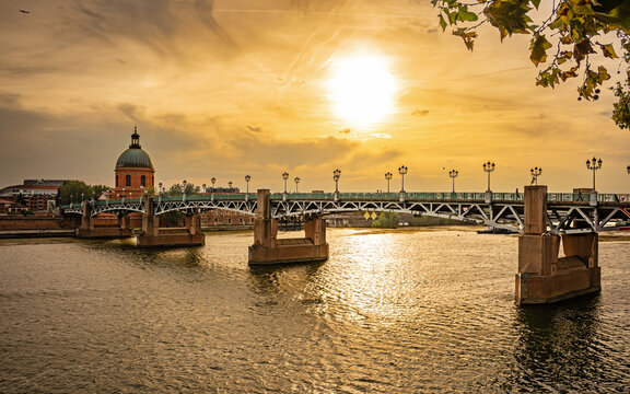 Toulouse, France - The Saint-Pierre Bridge and the Dome de la Grave in Toulouse at Golden Hour
