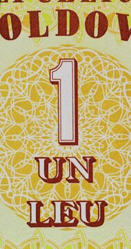 Stop Motion Macro Sequence of International Banknotes. Banknote details shift in stop motion macro sequence revealing colorful numerals emblems and engraved patterns from currencies of many countries.