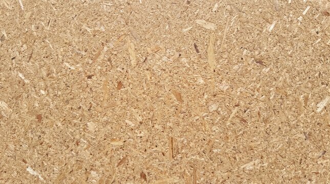 Close-up texture of Oriented Strand Board (OSB) wooden panel background