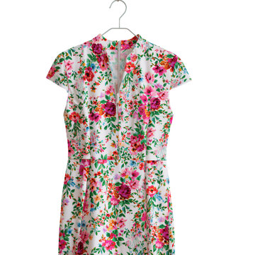 Floral nursing dress with hidden zipper for feeding displayed on hanger isolated on transparent background