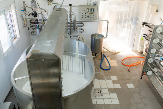 Cheese production equipment in an artisanal dairy plant