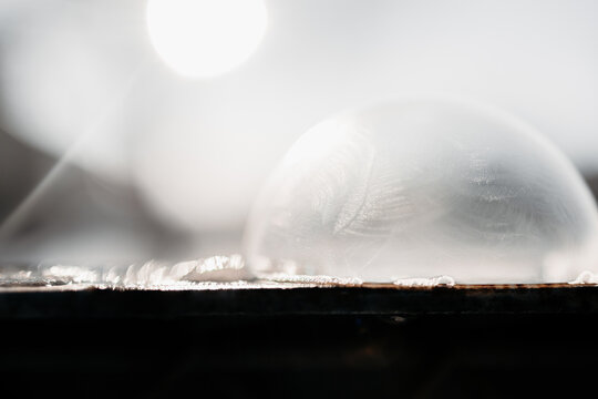 Frosted ice surface with soft light and abstract texture