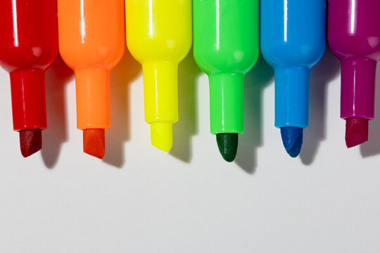 Colorful rainbow highlighter pen set on white background