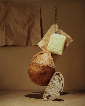 Artisan bread and butter levitation still life composition