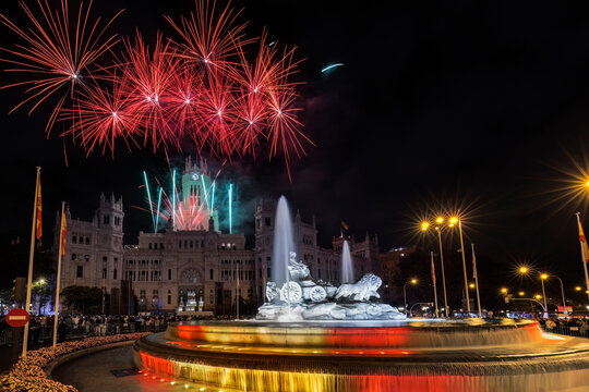 Firework display above Cibeles Palace and fountain in Madrid
