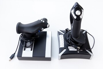 Two modern black and silver flight simulation game controllers © YouraPechkin