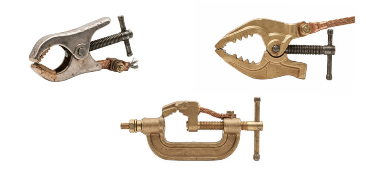 Vintage brass and steel clamps with serrated jaws for gripping metal