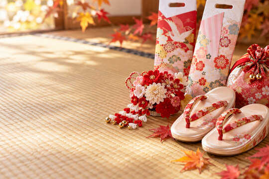 Traditional Japanese Shichi Go San Accessories with Zori Sandals and Autumn Maple Leaves