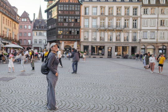 Woman sightseeing in historic Strasbourg square