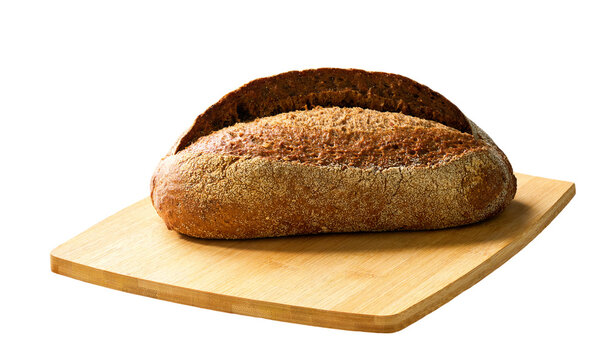 loaf of whole grain yeast-free buckwheat bread with flax seeds on cutting board, isolated on white background.