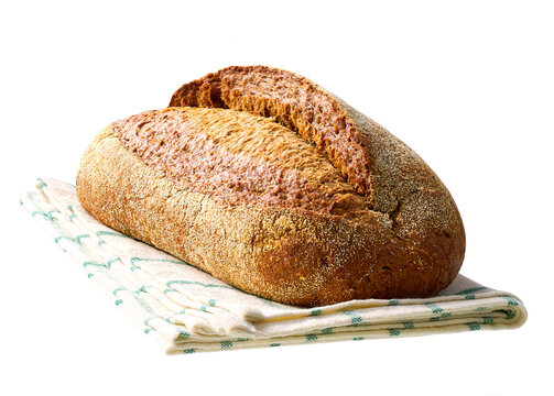 loaf of whole grain yeast-free buckwheat bread with flax seeds , isolated on white background.