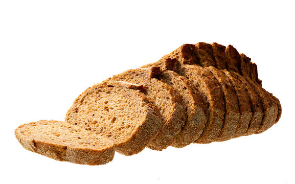 Sliced whole grain yeast-free buckwheat bread with flax seeds, isolated on white background.