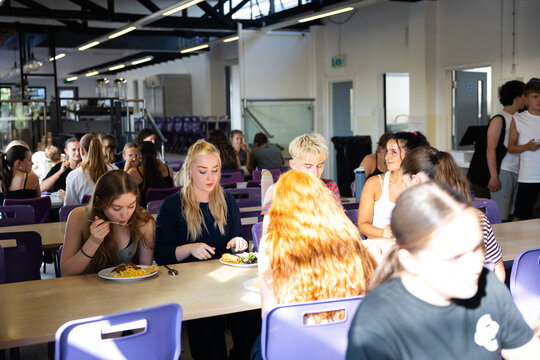 Dance company mingles during a busy lunch