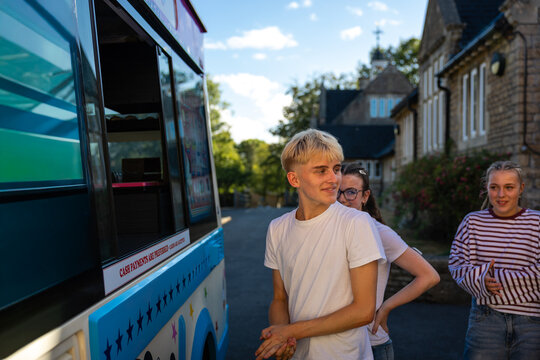 Waiting his turn at the ice cream van