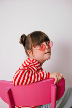 Portrait of young girl with Down syndrome