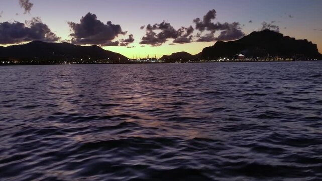Sailing at Sunset along the Coast of Palermo Sicily Italy 