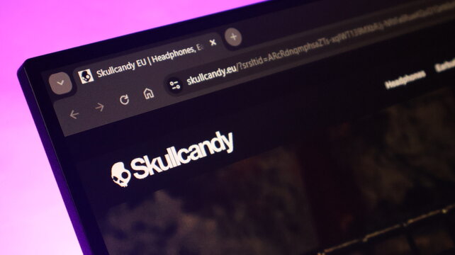 Skullcandy brand website home page displayed on black computer monitor screen highlighting audio gear marketing visuals for modern consumer electronics and lifestyle.