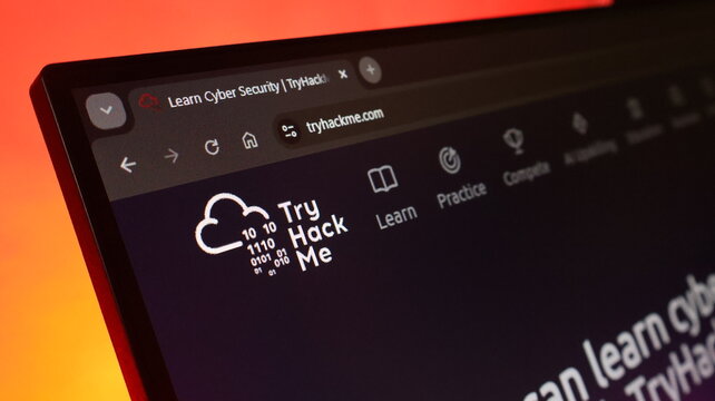 TryHackMe website for learning cybersecurity is displayed on laptop screen with cloud logo and binary code elements.