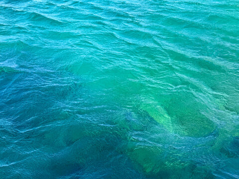Ocean blue turquoise waves aqua background.