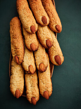 Almond cookies with crunchy texture arranged in a basket, ideal for dessert menus or festive gatherings