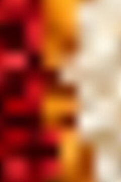 Abstract red orange and cream gradient mesh background with warm fiery tones