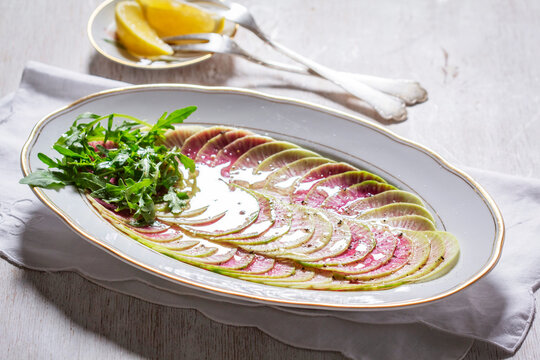 Watermelon Radish Carpaccio with Arugula and Lemon