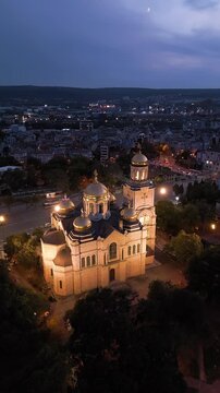 Dormition of the Theotokos Cathedral illuminated at twilight in Varna Bulgaria