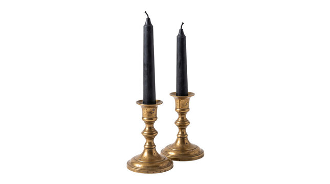 Vintage brass candlesticks with black taper candles, elegant antique brass candle holders set, gothic home decor accent isolated on white background