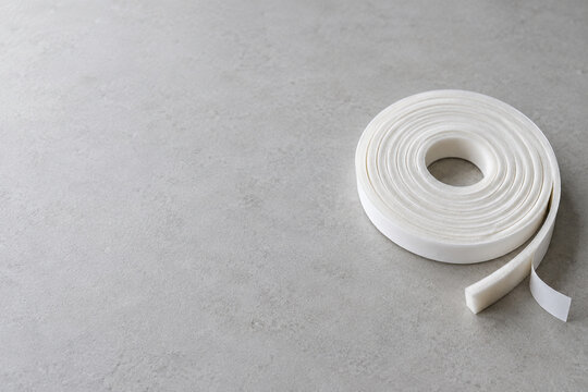 White self adhesive foam weatherstrip roll with copy space