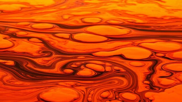 Orange marbled fluid bands swirl across an abstract full-frame texture. Motion graphics, title sequence, and artistic branding.