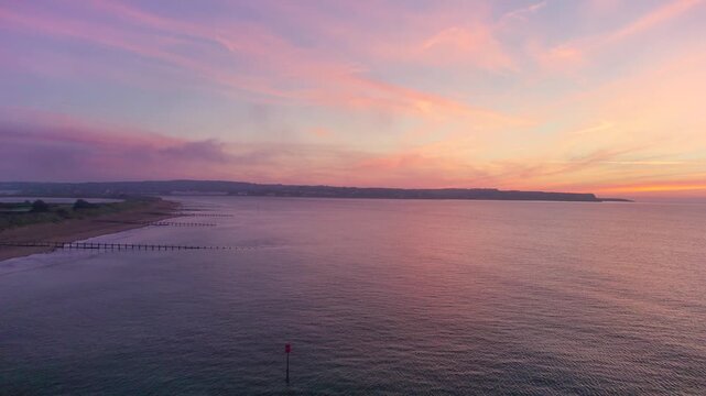 Sunrise over Exmouth and Dawlish Warren Beach, Devon, England, United Kingdom