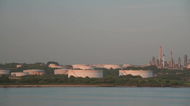 Sunrise over Gas Ships and Esso Oil Terminal, Southampton, Hampshire, England, United Kingdom