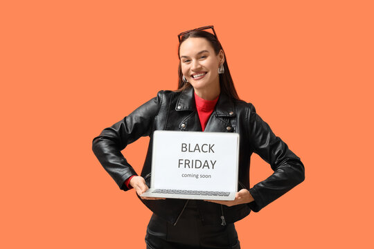 Black Friday sale and holiday shopping promotion, smiling woman holding laptop with announcement on screen against orange background