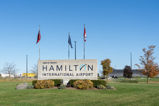 Mount Hope, Hamilton, Ontario, Canada - October 17, 2026: John C. Munro Hamilton International Airport entrance sign in Mount Hope, Hamilton, Ontario, Canada. 
