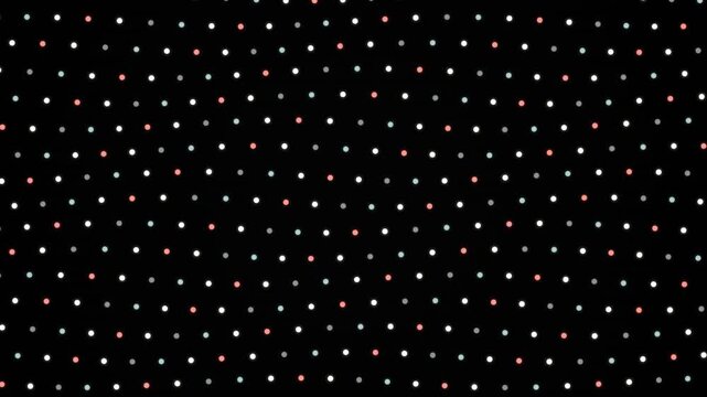 Small red and white dots float in a seamless looping pattern against a black background.