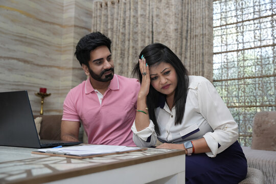 Indian Unhappy Couple don't understand each other. Crisis and relationship problems that come to an end. Concepts for sad couples with family problems or issues, divorce or quarrels